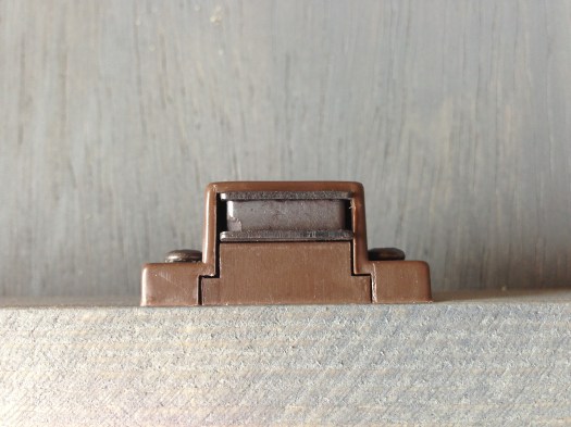 I attached a magnet clasp to "lock" the frame when it shuts. It's a pretty strong magnet for it's size!