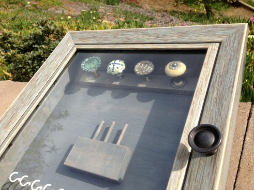 I chose to insert the glass from the frame back in, although... it also looked good open.