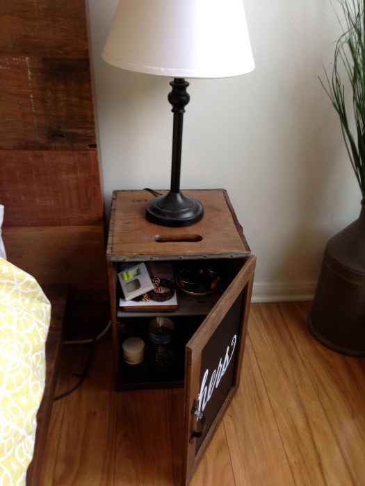 The one unplanned cool thing about this: at night when the lamp is on, the light bleeds down through the handle cut-out and through the back of the crate. It illuminates the inside of the crate really nicely!
