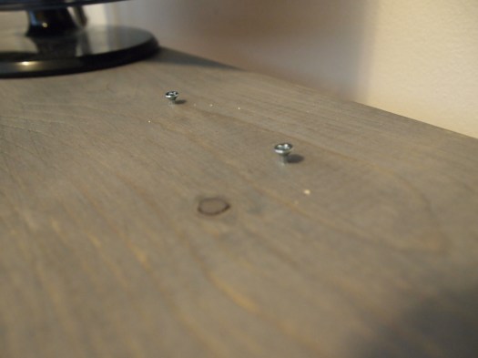 I used the template to mark out where my screws would go to anchor the TV to the board.