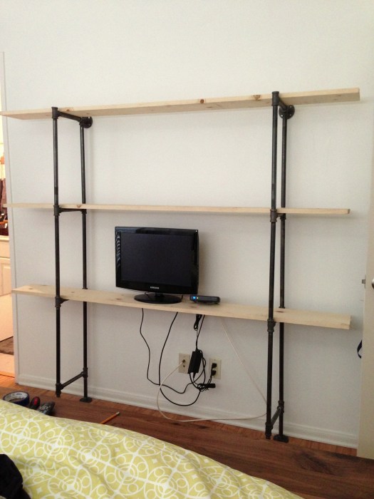 After I figured out the pipes, I got super excited and put the shelf up half-finished, and unstained. The wife approved! Success!