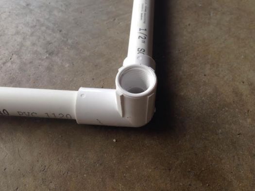 Our corner pieces: 3-way elbow joints. Home Depot only had this version with 2 slip joints and 1 screw-in. We had to adjust our measurements on the spot at Home Depot