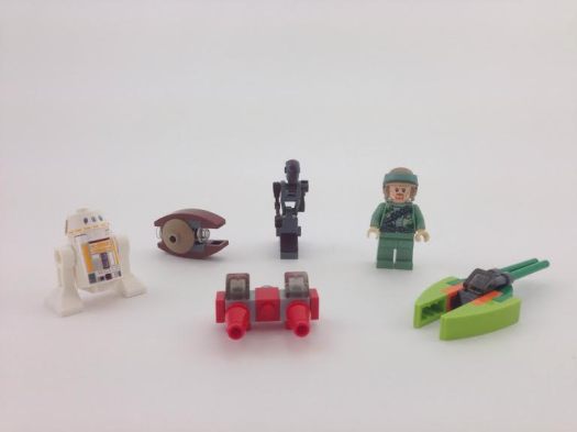 Tina was so excited about the lightbox she grabbed these star wars advent calendar toys that were sitting nearby to start testing our box. Earlier in the week she had teased me about how nerdy they were, but now they were the perfect objects for her to photograph!