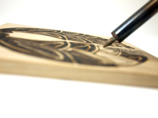 Find the best angles to hold your pen. If you leave your pen in one place for too long, it will burn a huge gash in your wood, so don't be too aggressive!